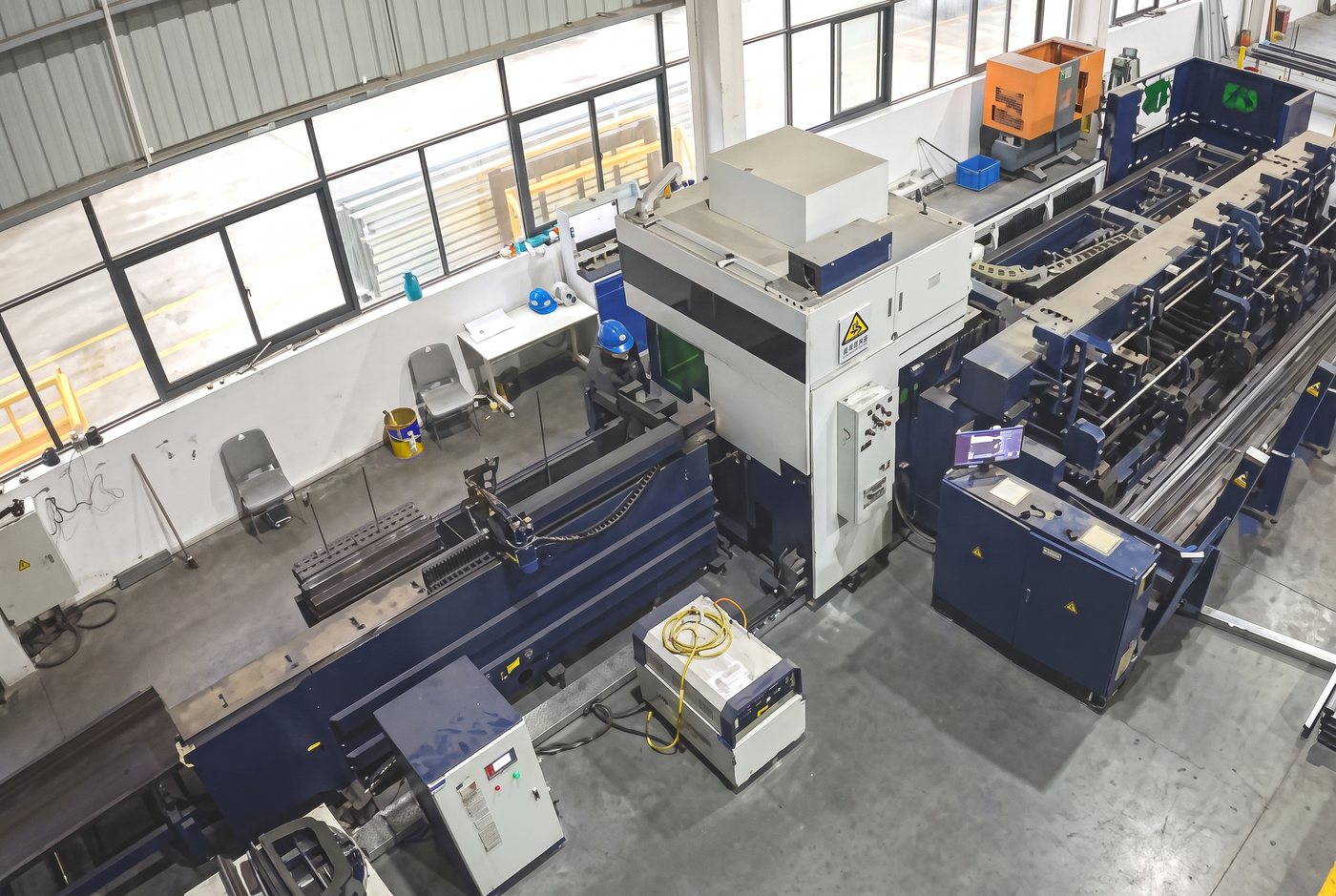 PrefabX modular home manufacturing: laser cutting