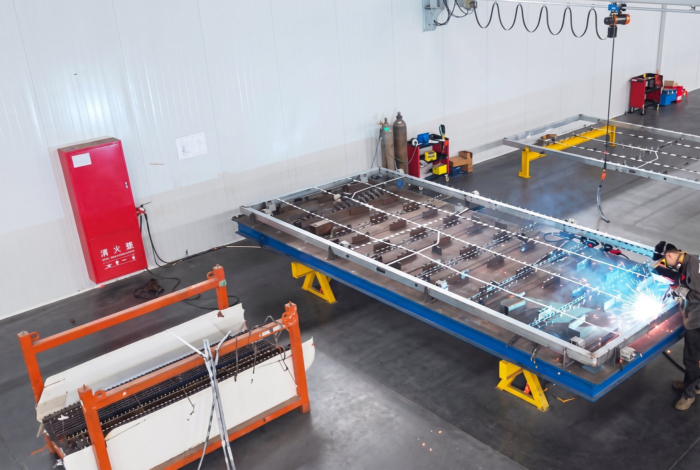 PrefabX modular home manufacturing: robotic welding
