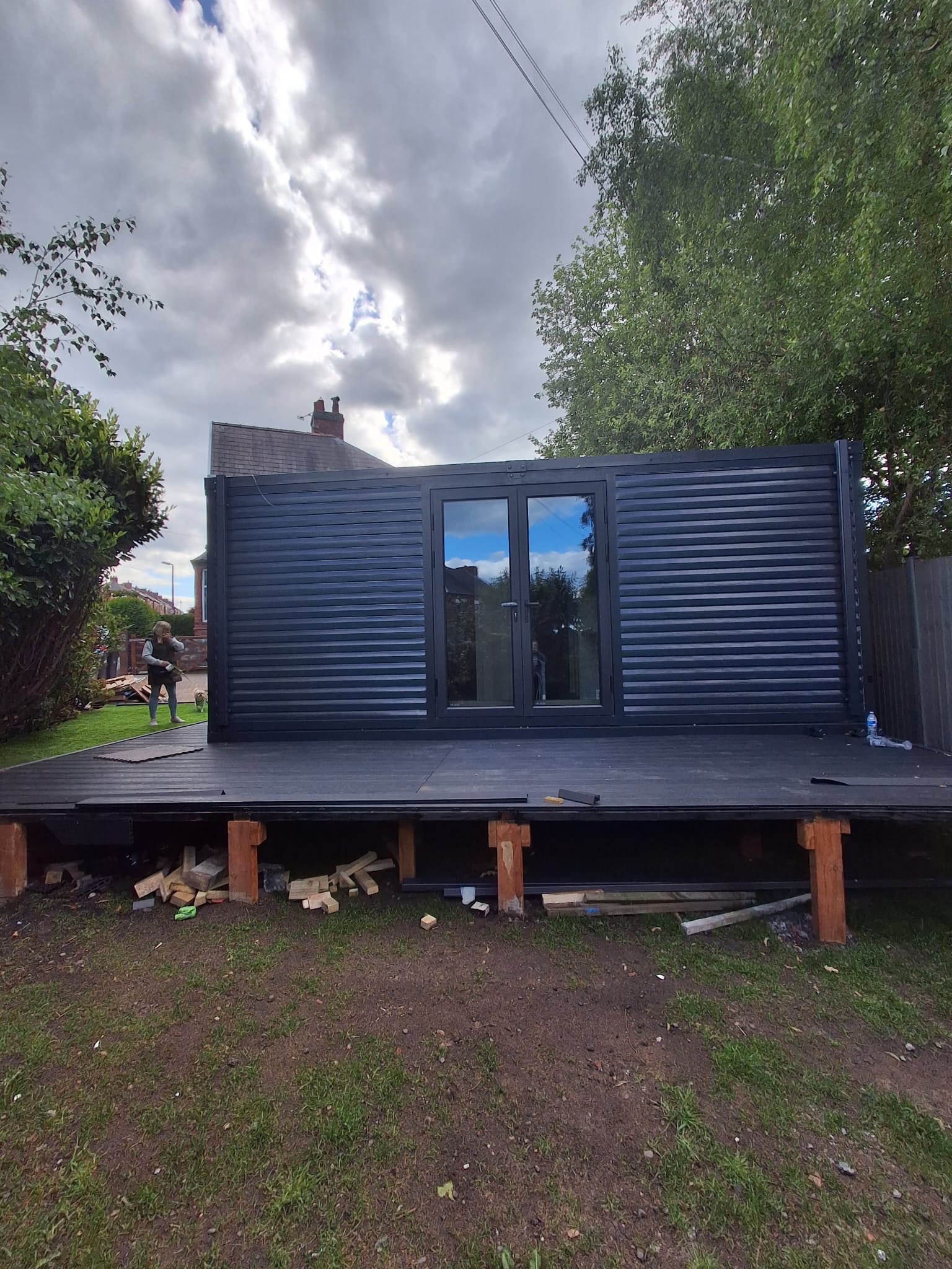 A finished PrefabX modular home building set on its foundations at a UK install